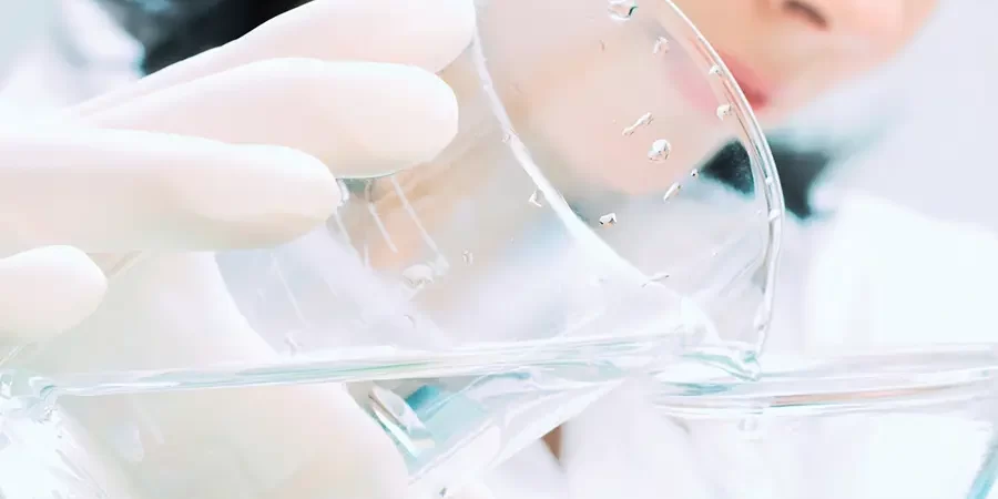 Chemist working in lab. Scotmas – Chlorine Dioxide Specialist. Chemist working in lab. Scotmas - Chlorine Dioxide Specialist.