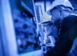 Two engineers looking at a system