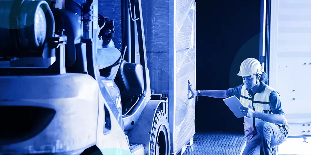 Stores Person Person working with forklift and checking stock